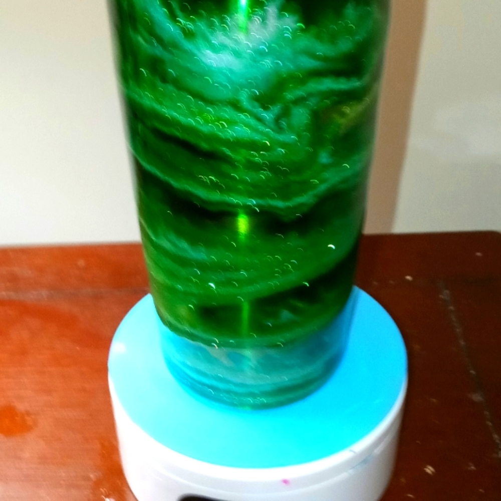 Custom handmade tumbler made by Carrie alcohol ink green